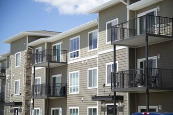 Exterior of Northridge Apartments showcasing the private balconies and patios.